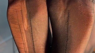 Watch Me Tease You with My Ripped Nylon Feet Through the Glass