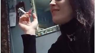 Bossy milf chats and smokes while teasing with her lips
