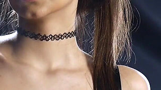 Brunette Smoking in Black Latex Outfit Slow Sensual Scene