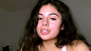 Amateur young brunette enjoys dildo on solo masturbation