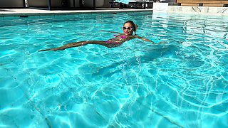 Monika Fox Poses In Pink Bikini And Swims In Pool Surrounded