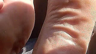 Backseat Driver Gets Her Toes N Soles Sucked on with Giving the Driver a Long Toejob