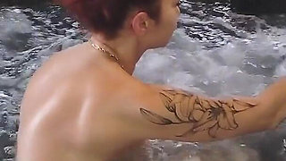 Relaxing in the Jacuzzi, They're Massaging My Breasts