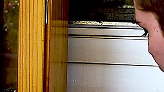 Shaved Head Goth Smokes Outside