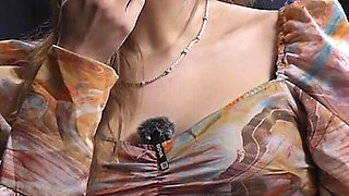 Sweet Russian Blonde Smoking in Colorful Blouse