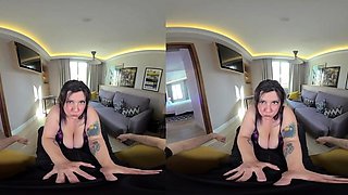 A super sexy brunette massages her big boobs