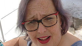 Calm Outdoor Smoking Moment with a Playful Lipstick Look