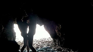 Couple recorded at the beach, inside the cave