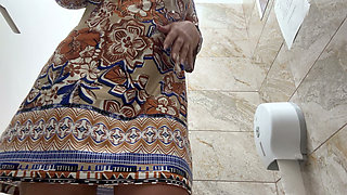 Sexy milf has intense orgasm in public toilet