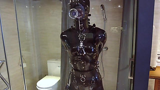 Mz20 - the Girl in Latex Clothing Locked in a Glass Room