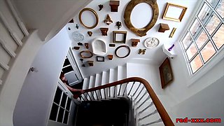 Insatiable MILF Red XXX masturbates on the stairs