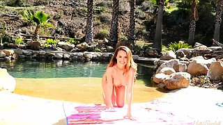 All natural cutie Dillion Harper cools off in the pool and
