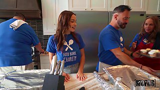 Rissa May’s Busty Charm in a Bank of Desire